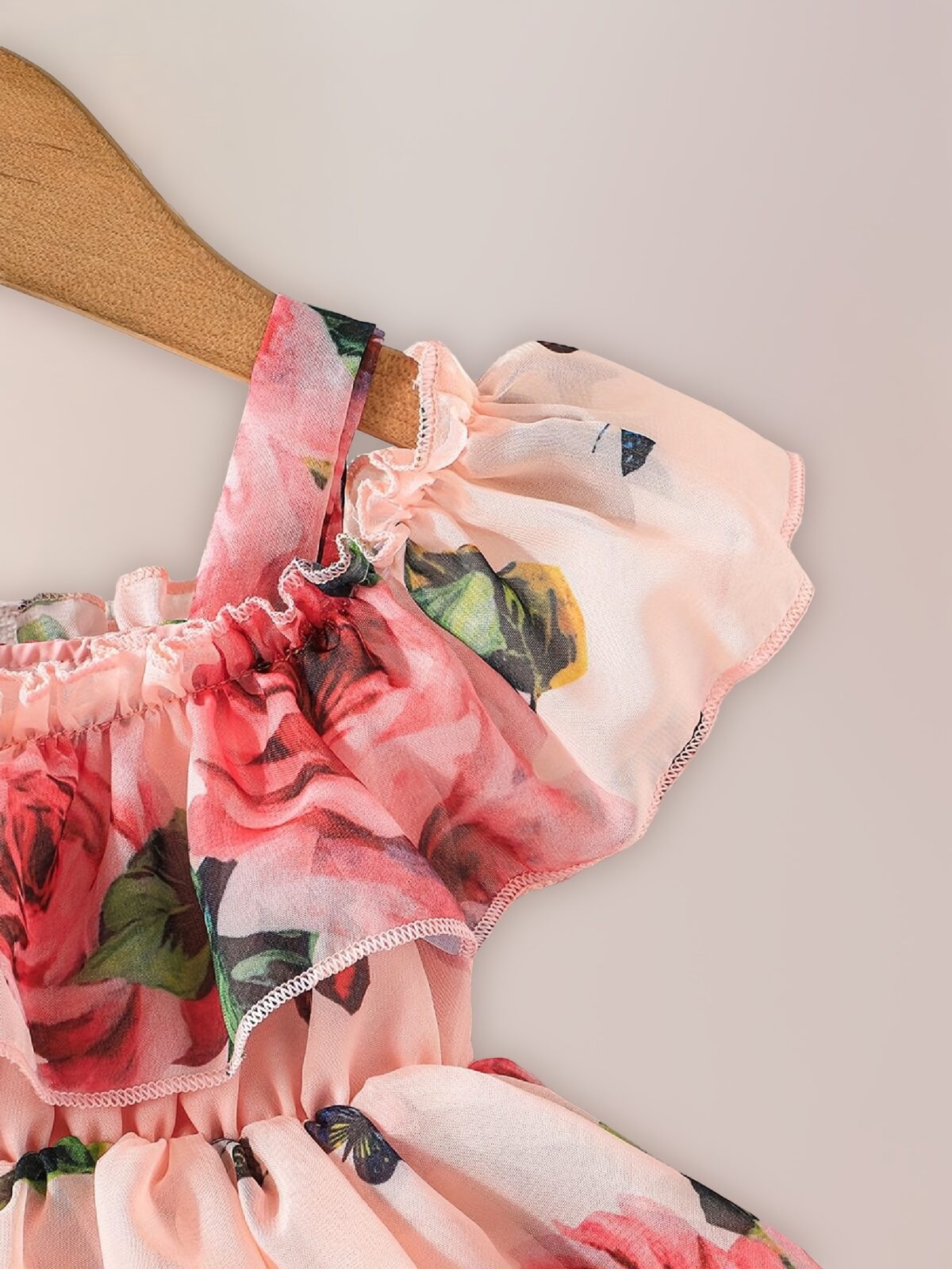 Adorable little girl twirling in a beautiful rose garden floral print dress Perfect summer outfit for kids