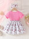 Adorable baby girl wearing a lightweight Summer Meadow floral print dress perfect for casual summer outings