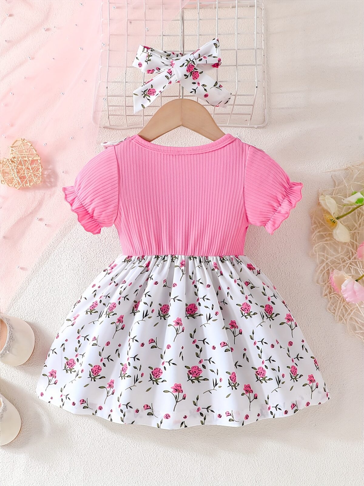 Adorable baby girl wearing a lightweight Summer Meadow floral print dress perfect for casual summer outings