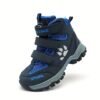 Stylish and durable FANGFIUP Kids Winter Boots perfect for snowy adventures These boots are shown in action with a child playing in the snow