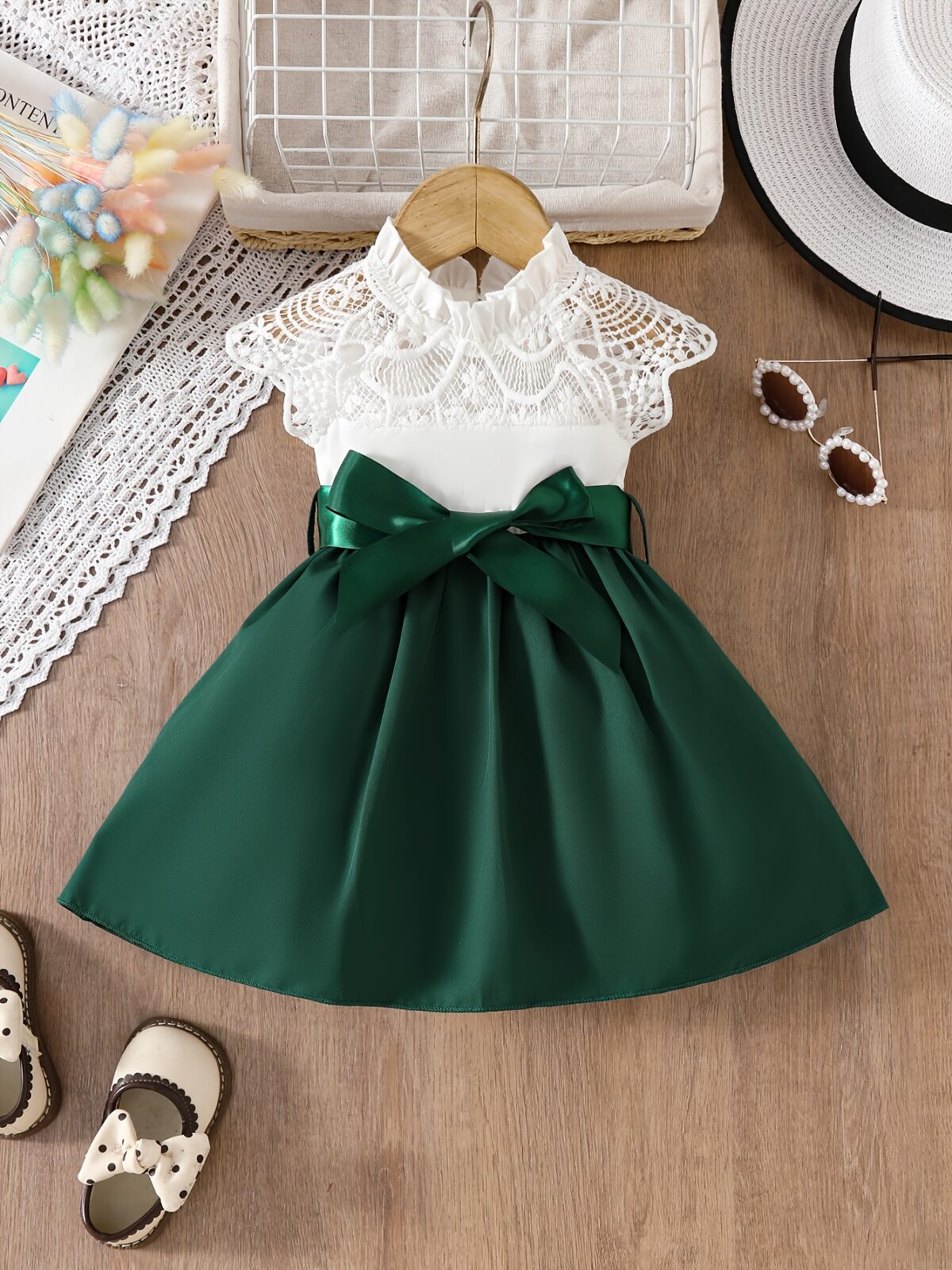 Adorable girl wearing a white Summer Bloom Lace Trim Dress showcasing its delicate lace details and summery style
