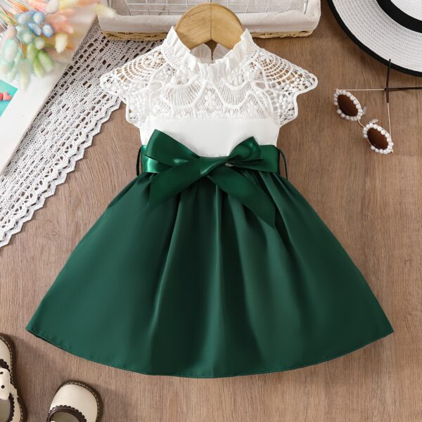 Adorable girl wearing a white Summer Bloom Lace Trim Dress showcasing its delicate lace details and summery style
