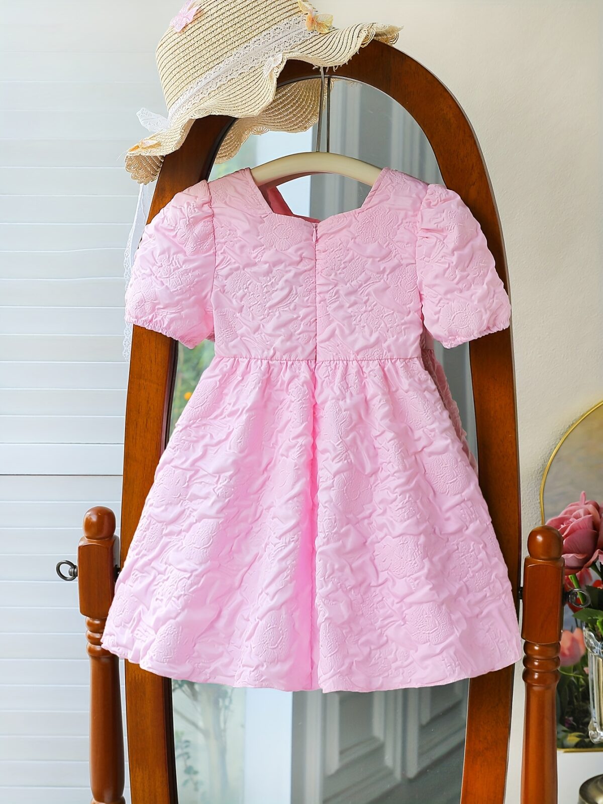 Adorable Little Darling Girls Party Dress from Newness perfect for birthdays weddings or any special occasion The dress features insert details about the dress eg a beautiful floral print sparkly sequins a flowing skirt