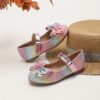 Adorable rainbow sparkly Mary Jane flats for girls perfect for adding a touch of sparkle to any outfit Comfortable and stylish kids shoes from Newness