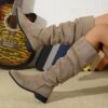 Newness Slouchy Suede Mid Calf Boots in rich brown suede leather showcasing the comfortable slouchy fit and mid calf height Perfect for adding a touch of effortless chic to any winter outfit