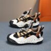 Stylish and comfortable Velocity Boys Sneakers in multiple colors perfect for any occasion Showcasing the sneakers design details and fit