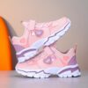Newness Starlight Glow Running Shoes Trendy black and pink luminous running shoes showcasing comfort and style
