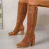 Newness Effortless Chic Knee High Boots Elevate your style with these versatile boots perfect for any season Shown in a close up showcasing the sleek design and rich material