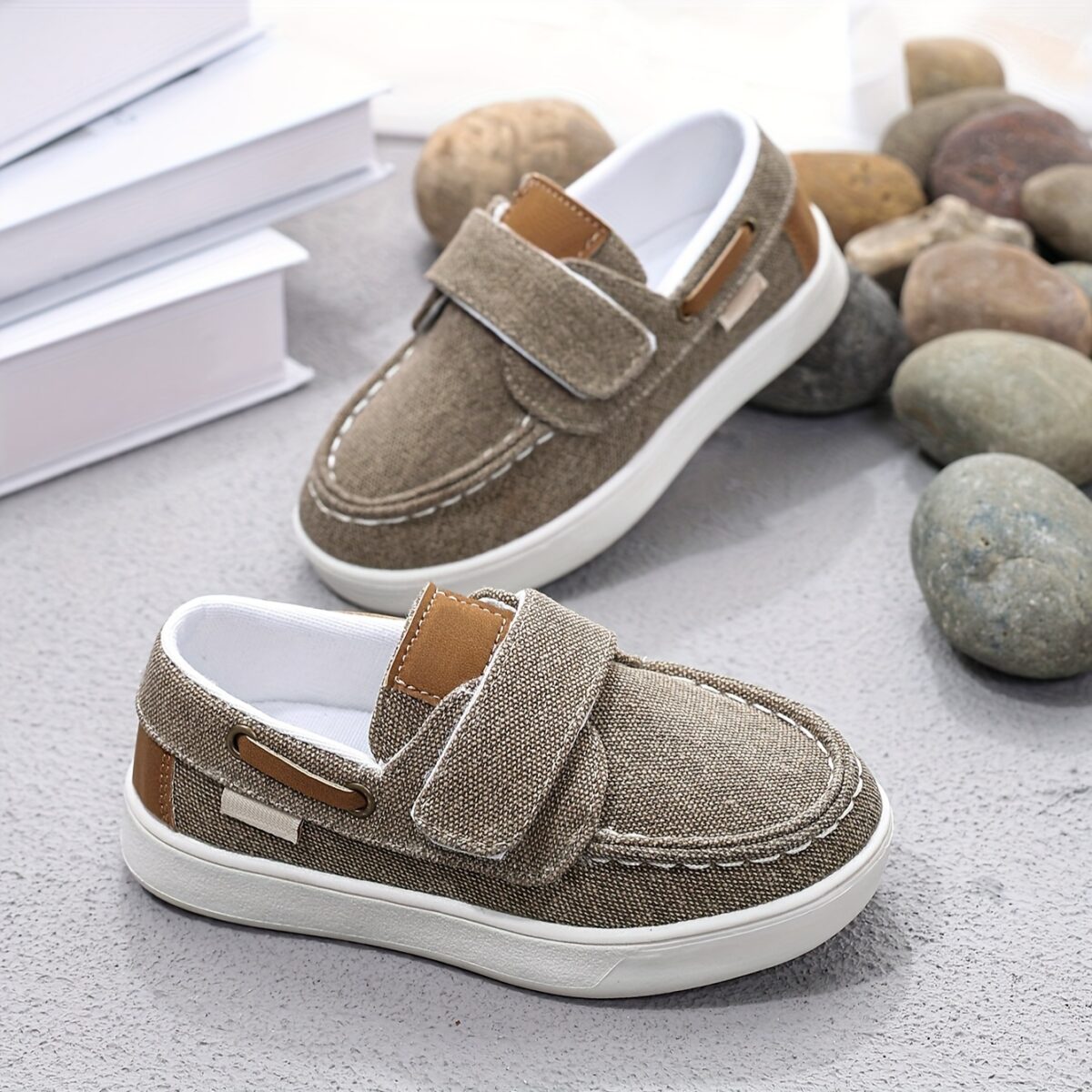 Stylish and comfortable blue canvas shoes for boys perfect for everyday wear The shoes feature a classic design with a touch of modern style