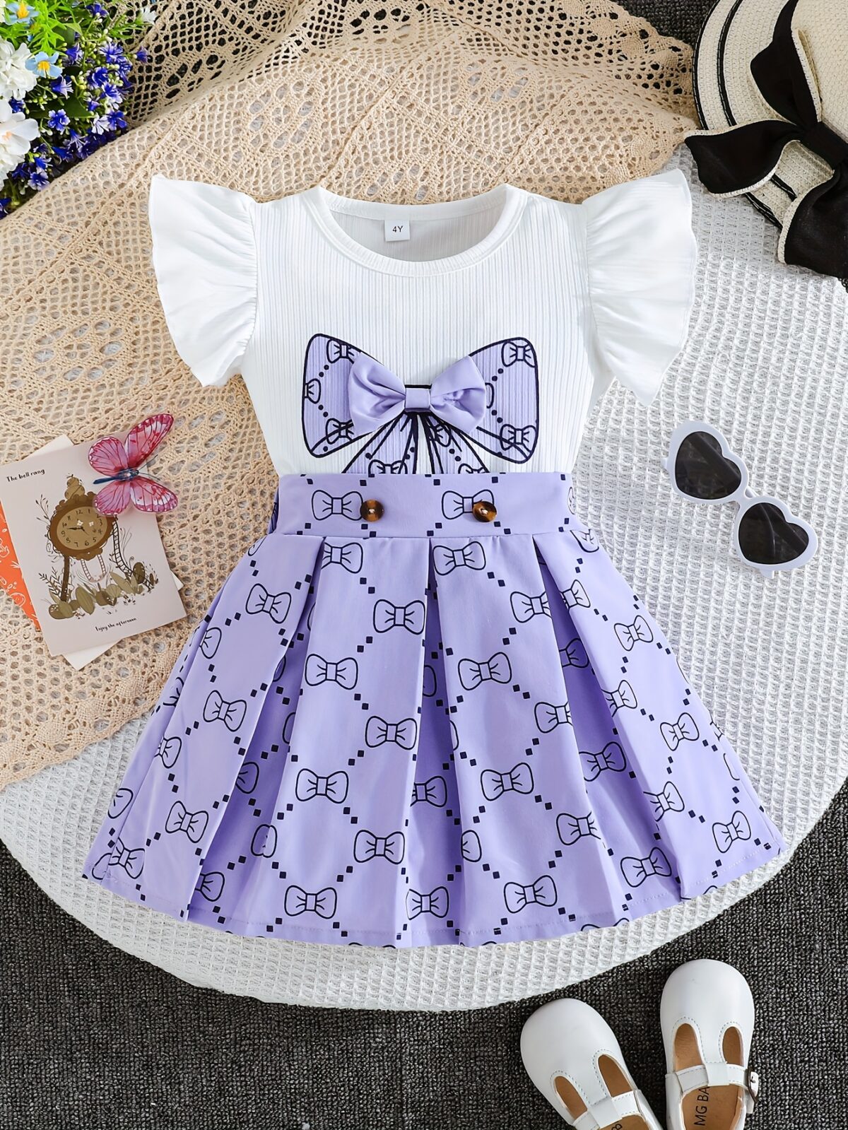 Adorable girls summer outfit Newnesss Summer Playdate Bow Skirt Set A charming two piece set featuring a stylish bow skirt and coordinating top