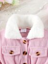 Adorable baby girl wearing a cozy corduroy dress set in fall colors perfect for autumn and winter The outfit includes a dress and matching pants