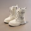 Newness Lace Up Kids Chunky Boots A pair of stylish chunky boots for kids featuring lace up detailing Perfect for keeping little feet warm and trendy