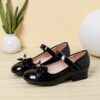 Adorable Darling Bow Girls Mary Janes in pink perfect for parties and everyday wear These classic Mary Janes feature a darling bow detail