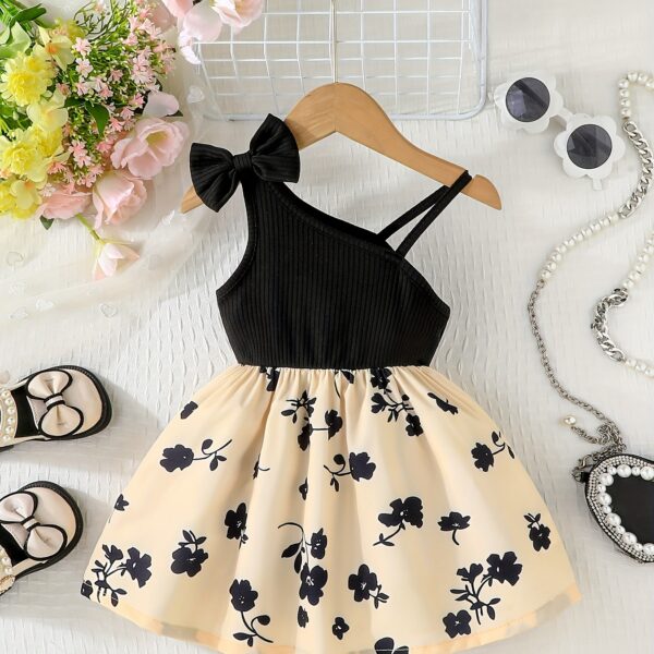Baby girl wearing adorable Summer Bloom floral print dress Newness baby clothes