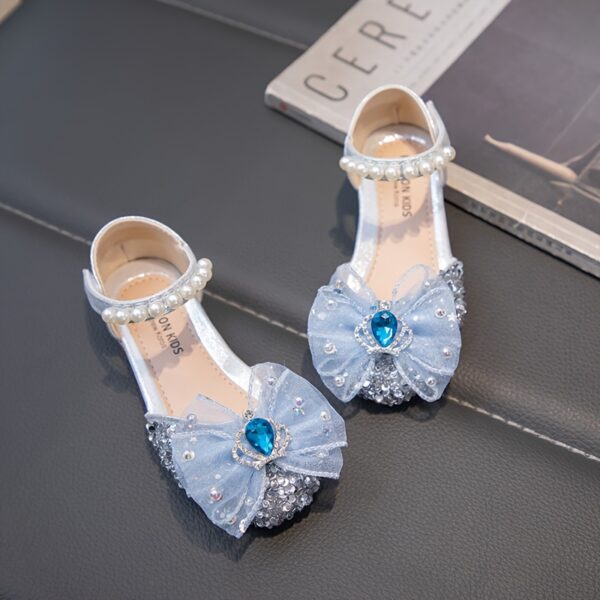 Close-up of Newness's Enchanted Garden Rhinestone Princess Shoes, showcasing sparkling rhinestones and delicate design. Perfect for a young girl.