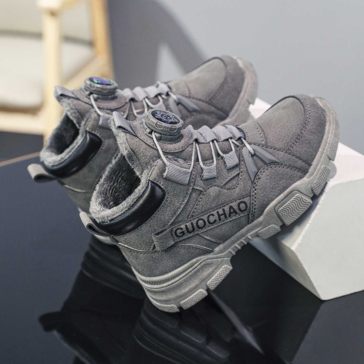 Stylish boys high top sneakers from Newness perfect for winter adventures Durable and fashionable design in a range of colors