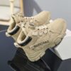 Stylish boys high top sneakers from Newness perfect for winter adventures Durable and fashionable design in a range of colors