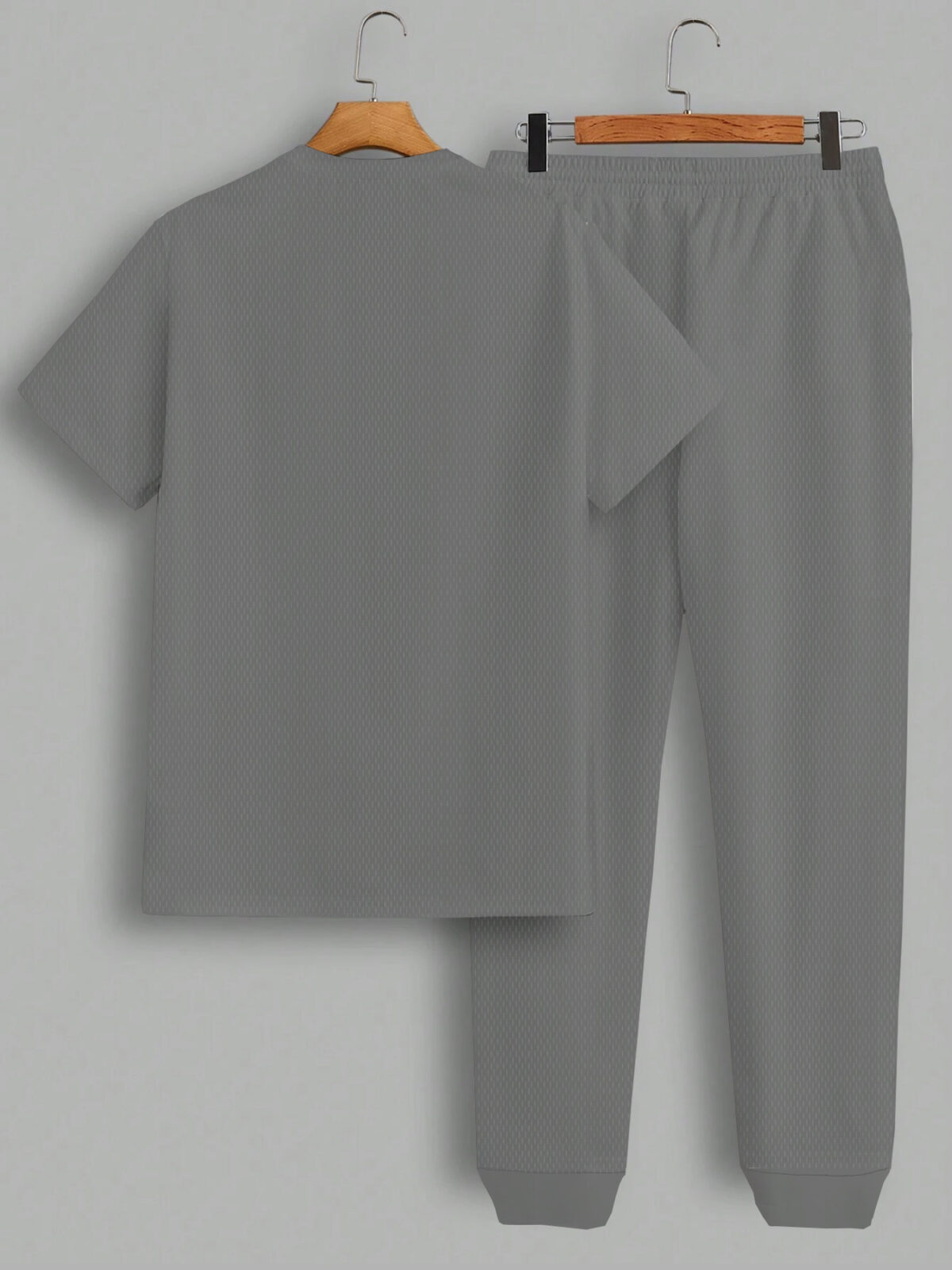 Model wearing the Newness Dubai Nights Mens Casual Set a stylish and comfortable two piece outfit perfect for summer evenings The set features a modern fit and breathable fabric