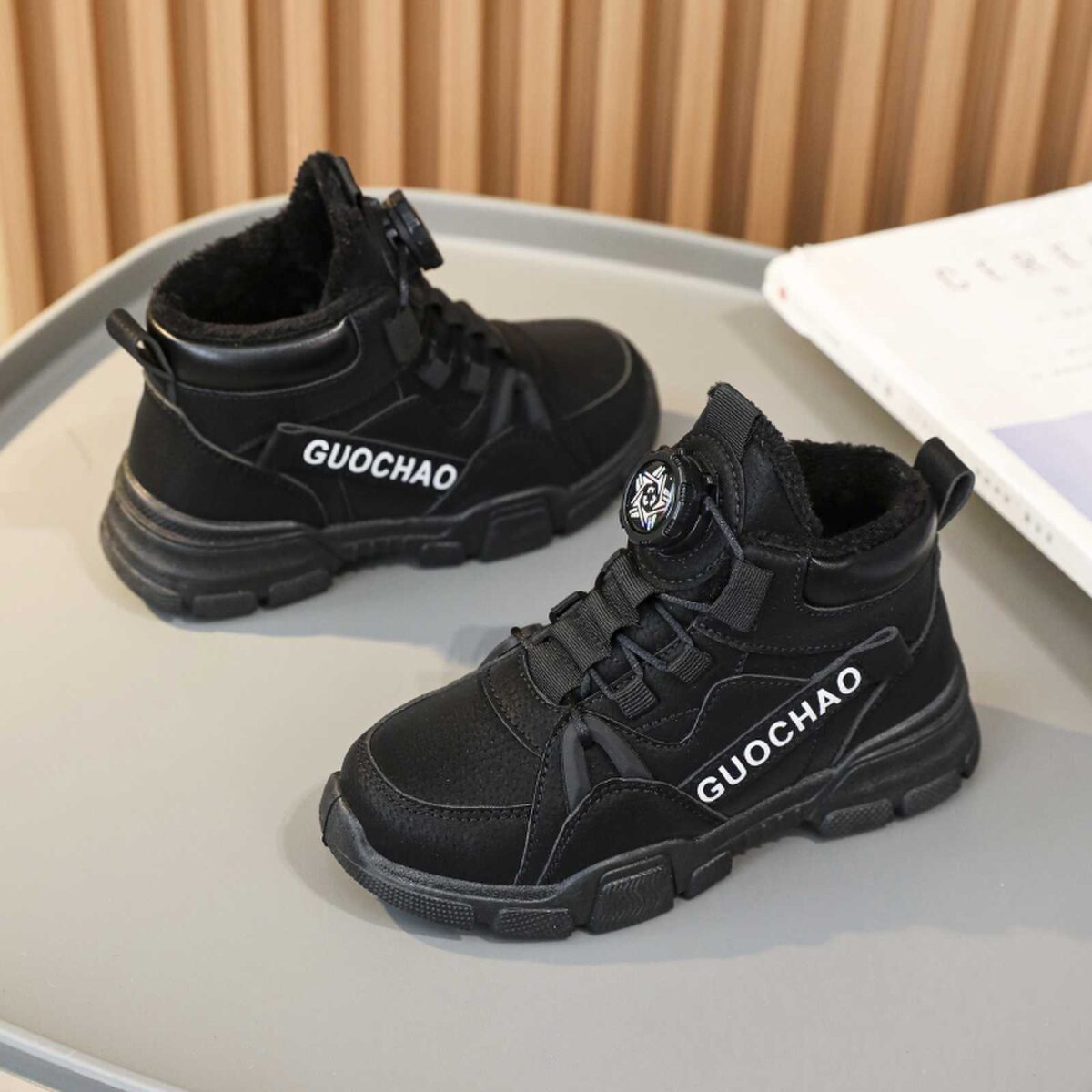 Stylish boys high top sneakers from Newness perfect for winter adventures Durable and fashionable design in a range of colors