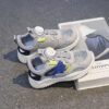 Newness Dynamic Play Kids Mesh Sneakers in action A boy energetically playing showcasing the stylish and breathable design of the shoes