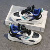Newness Dynamic Play Kids Mesh Sneakers in action A boy energetically playing showcasing the stylish and breathable design of the shoes