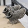 Stylish boys high top sneakers from Newness perfect for winter adventures Durable and fashionable design in a range of colors