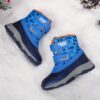 Stylish and durable Newness Explorer Kids Winter Boots perfect for snowy adventures Image shows children wearing the boots playing in the snow