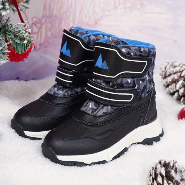 Stylish and durable Newness Explorer Kids Winter Boots perfect for snowy adventures Image shows children wearing the boots playing in the snow