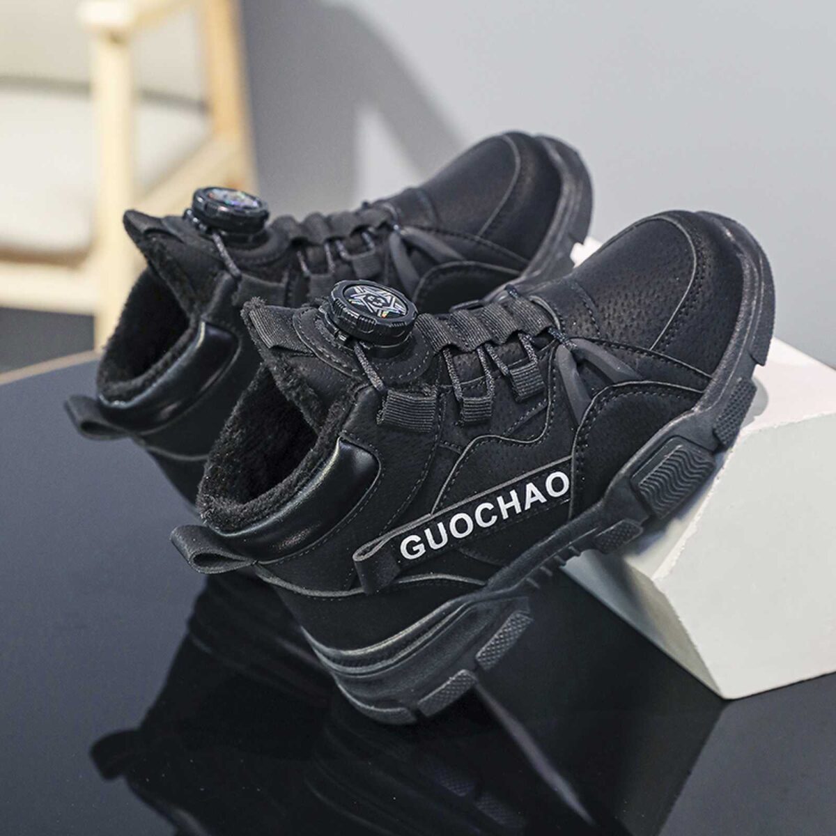 Stylish boys high top sneakers from Newness perfect for winter adventures Durable and fashionable design in a range of colors