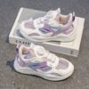 Newness Dynamic Play Kids Mesh Sneakers in action A boy energetically playing showcasing the stylish and breathable design of the shoes