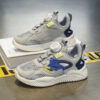 Newness Dynamic Play Kids Mesh Sneakers in action A boy energetically playing showcasing the stylish and breathable design of the shoes