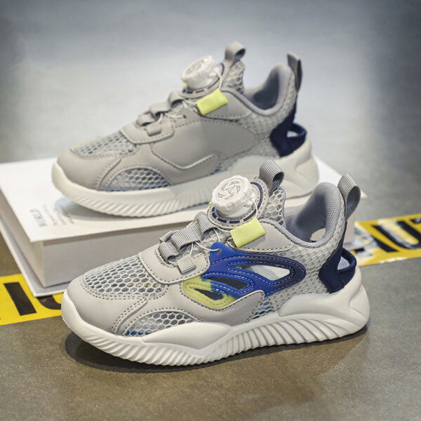 Newness Dynamic Play Kids Mesh Sneakers in action A boy energetically playing showcasing the stylish and breathable design of the shoes