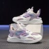 Newness Dynamic Play Kids Mesh Sneakers in action A boy energetically playing showcasing the stylish and breathable design of the shoes