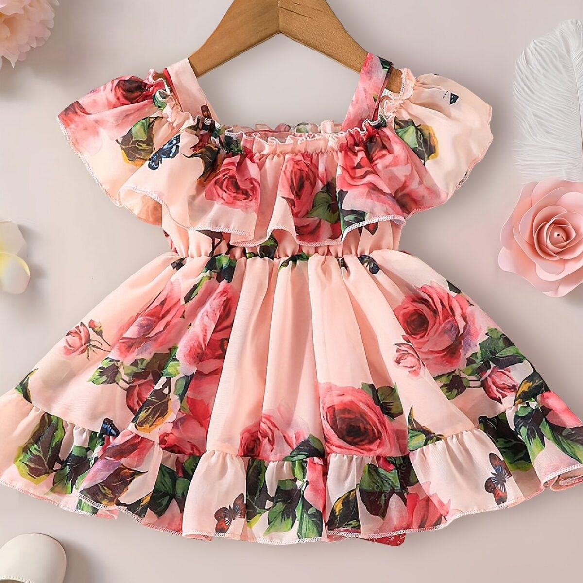 Adorable little girl twirling in a beautiful rose garden floral print dress Perfect summer outfit for kids