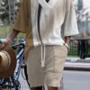 Newness Effortless Knit Summer Set A luxurious knit two piece set perfect for summer Model wears a relaxed fit knit top and matching skirt in a soft summery color