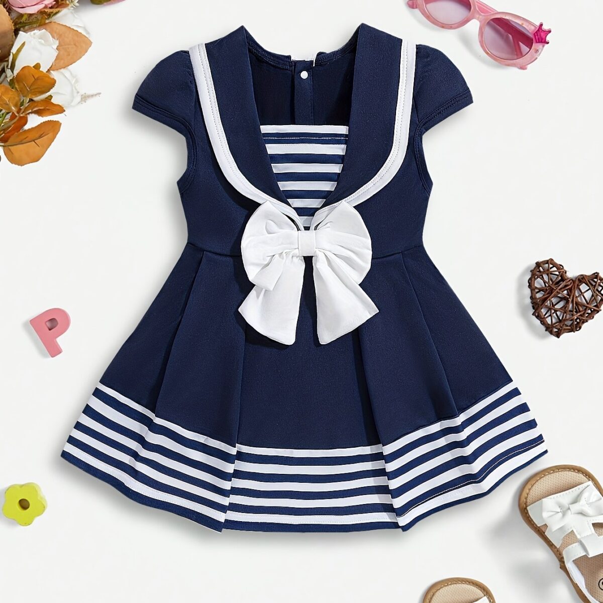 Adorable summer sailor stripe baby girl dress perfect for parties or everyday wear