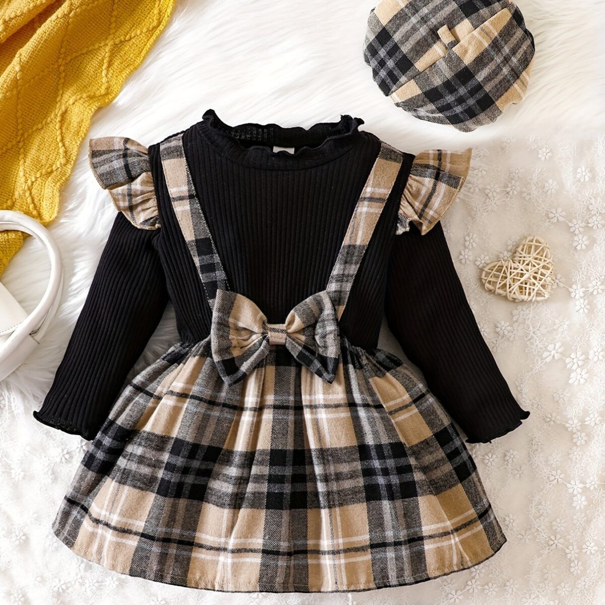 Adorable baby girl wearing a darling plaid skirt set and beret Perfect spring or fall outfit